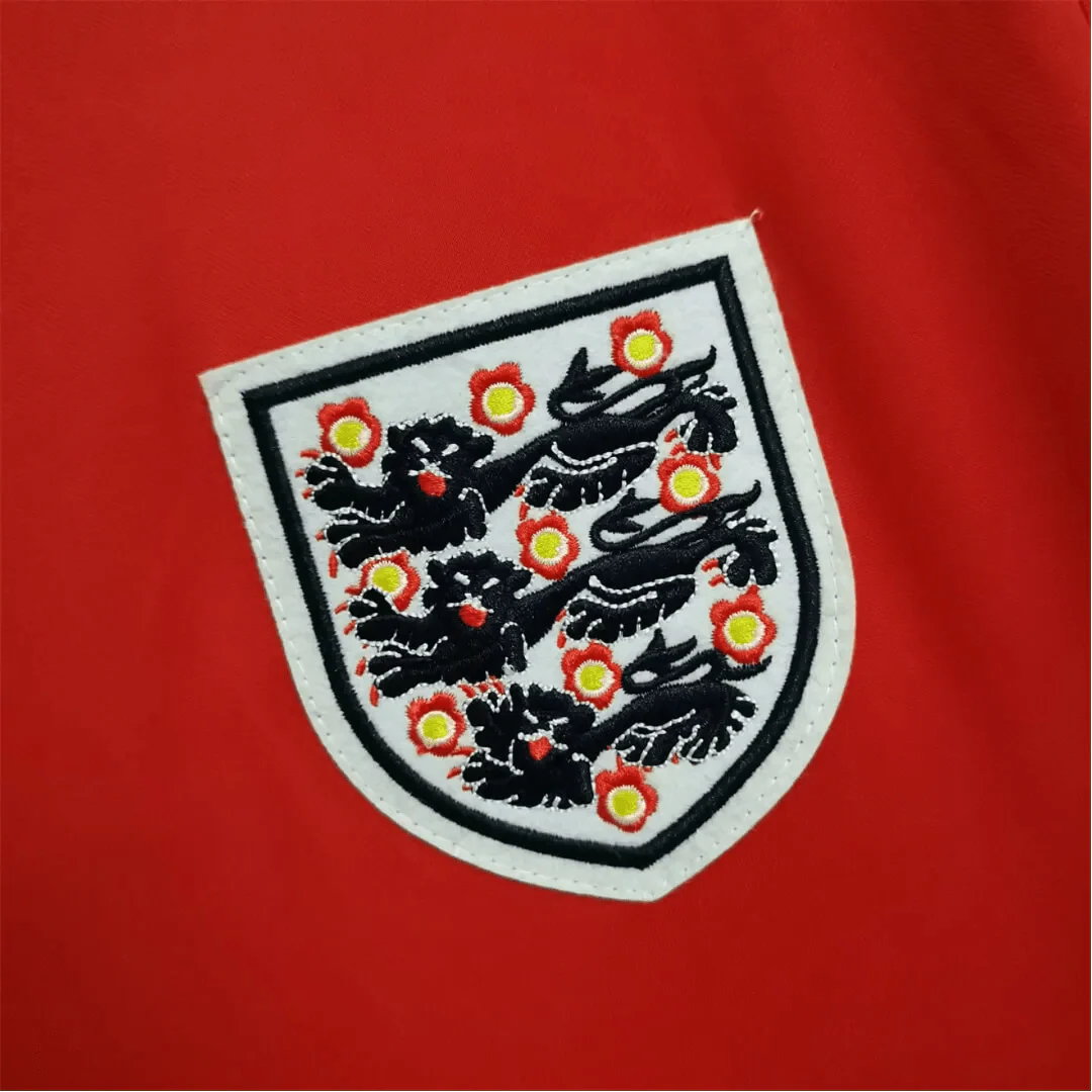https://cdn.shopify.com/s/files/1/0826/7228/8075/files/1966-england-away-retro-kit-249354.webp?v=1741196944