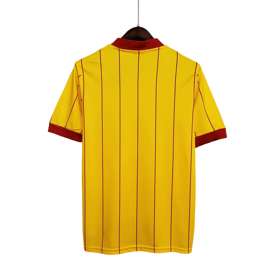https://cdn.shopify.com/s/files/1/0826/7228/8075/files/19841985-liverpool-crown-paints-yellow-away-retro-kit-classickits433-769471.webp?v=1741199199