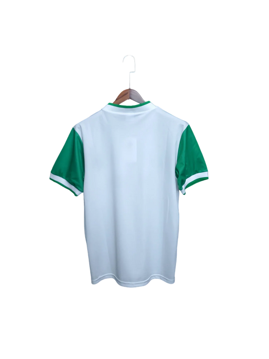 https://cdn.shopify.com/s/files/1/0826/7228/8075/files/19851986-glasgow-celtic-cr-smith-away-kit-classickits433-665102.webp?v=1741199130