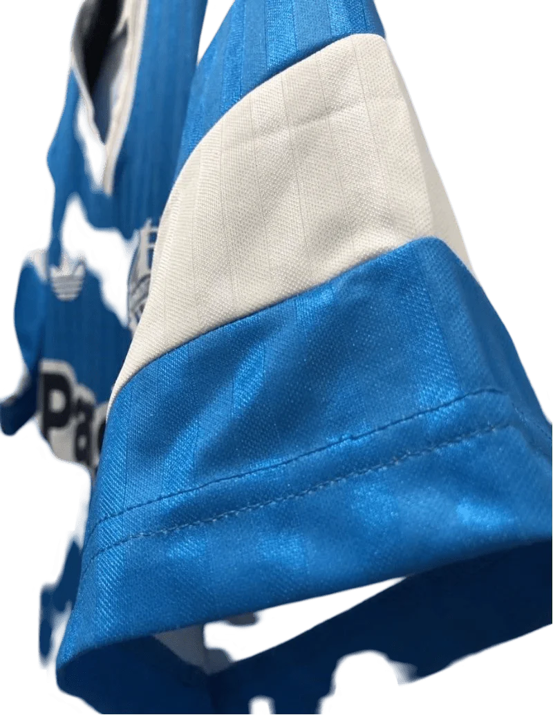 https://cdn.shopify.com/s/files/1/0826/7228/8075/files/19901991-olympique-de-marseille-panasonic-away-retro-jersey-426088.webp?v=1741199414