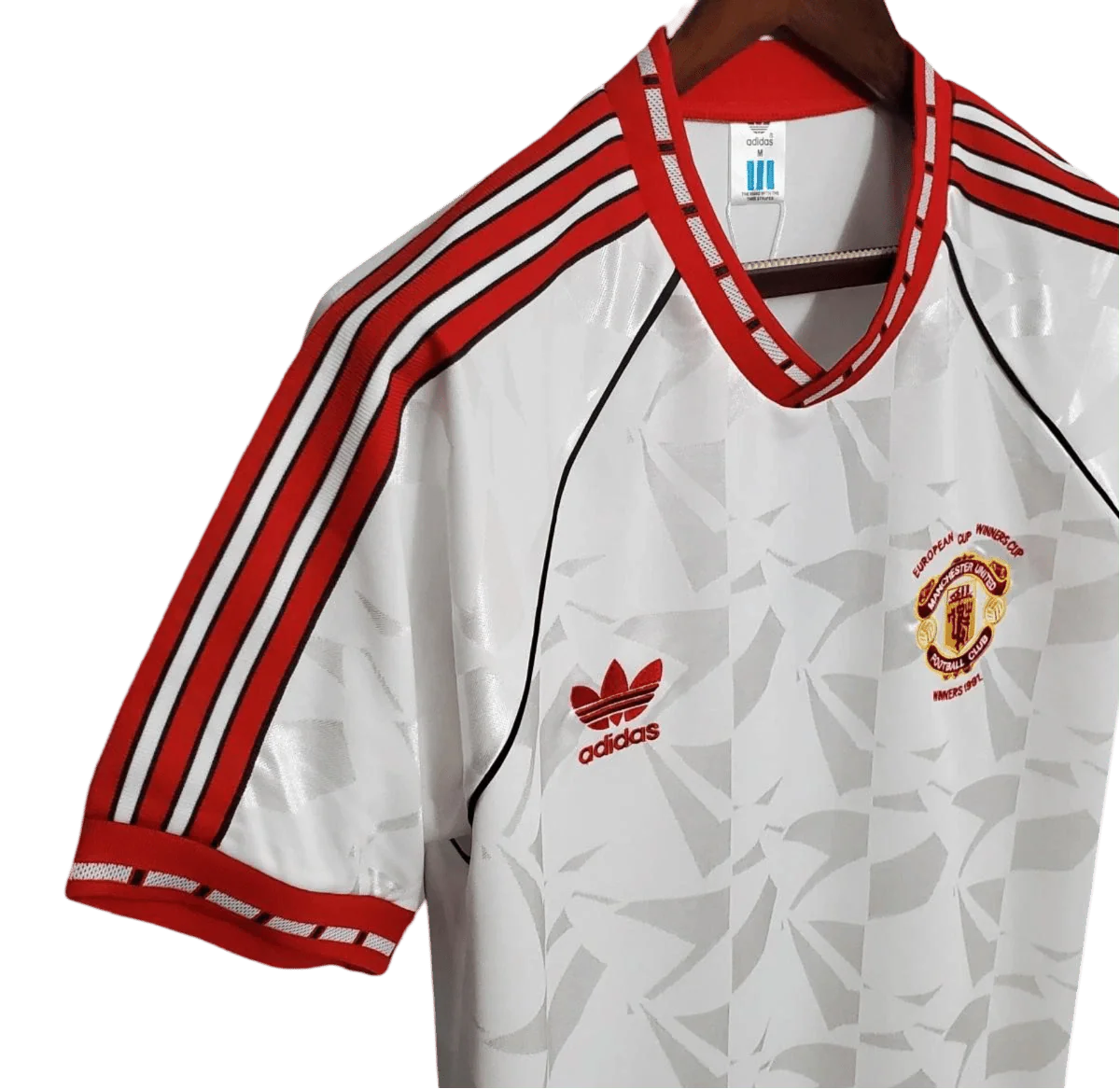 https://cdn.shopify.com/s/files/1/0826/7228/8075/files/19911992-manchester-united-white-third-retro-kit-classickits433-180049.webp?v=1741199137