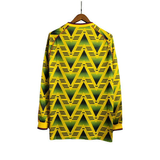 https://cdn.shopify.com/s/files/1/0826/7228/8075/files/19911993-arsenal-jvc-away-retro-kit-long-sleeve-classickits433-179288.webp?v=1741198385