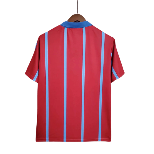 https://cdn.shopify.com/s/files/1/0826/7228/8075/files/19931995-aston-villa-muller-home-retro-kit-classickits433-990496.webp?v=1741199261