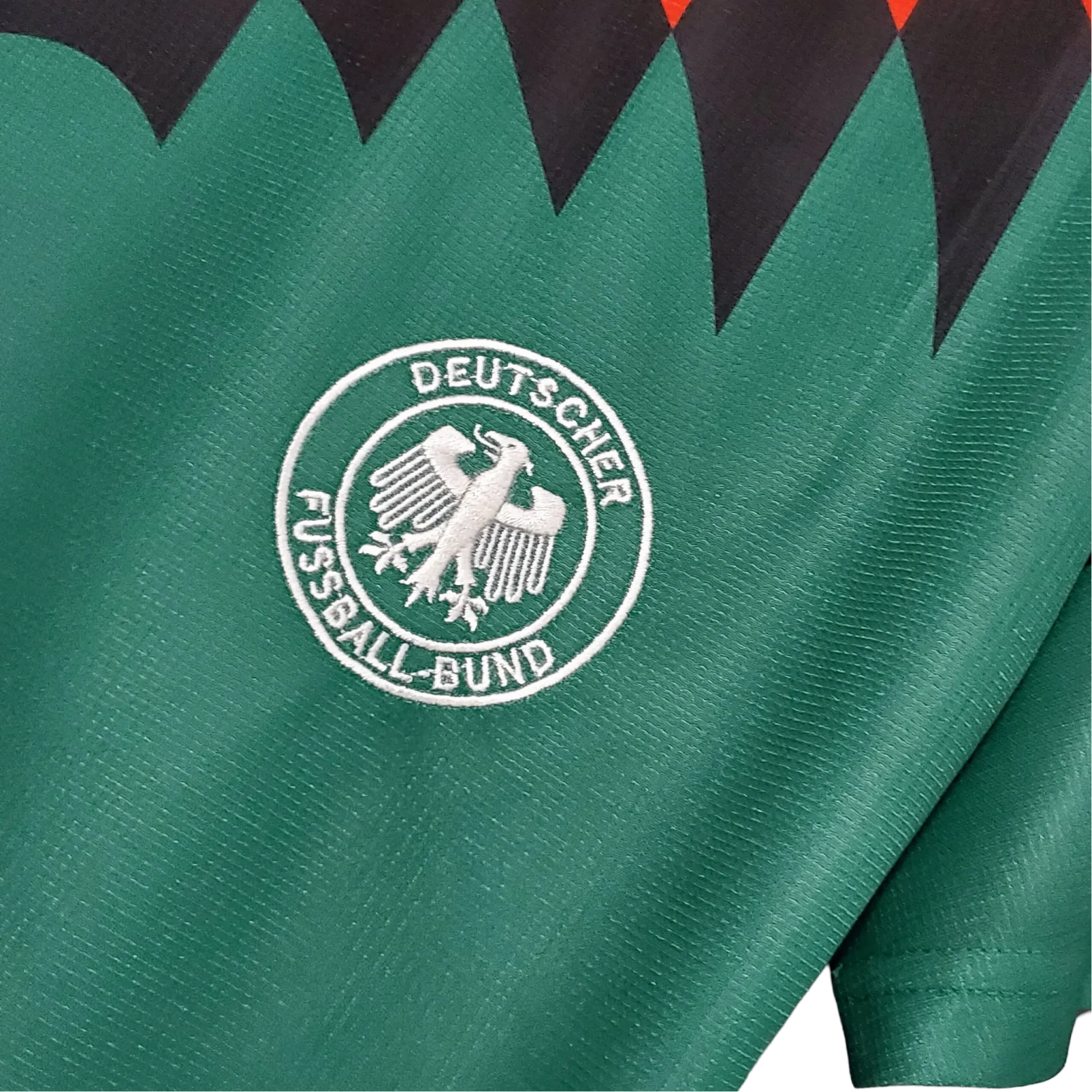https://cdn.shopify.com/s/files/1/0826/7228/8075/files/1994-germany-world-cup-second-retro-kit-612096.webp?v=1741197039