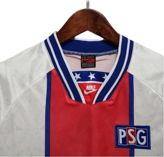 https://cdn.shopify.com/s/files/1/0826/7228/8075/files/19941995-paris-saint-germain-away-white-retro-jersey-534062.webp?v=1741199359
