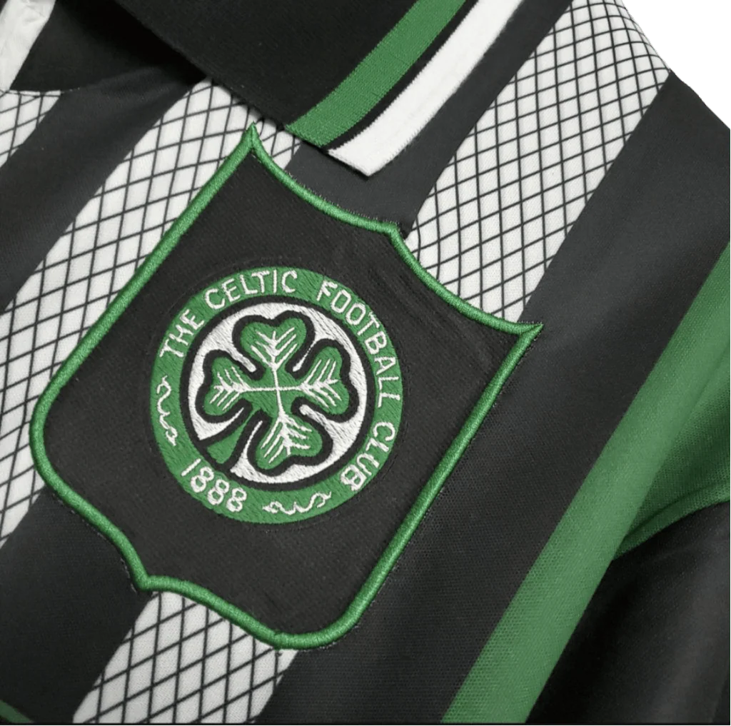 https://cdn.shopify.com/s/files/1/0826/7228/8075/files/19941996-glasgow-celtic-cr-smith-away-kit-classickits433-102160.webp?v=1741199140