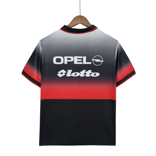 https://cdn.shopify.com/s/files/1/0826/7228/8075/files/19951996-ac-milan-opel-training-black-retro-kit-classickits433-486151.webp?v=1741198815