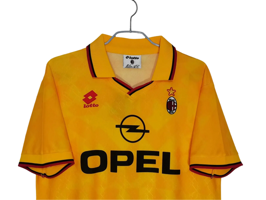 https://cdn.shopify.com/s/files/1/0826/7228/8075/files/19951996-ac-milan-opel-yellow-3rd-away-retro-kit-996419.webp?v=1741197277
