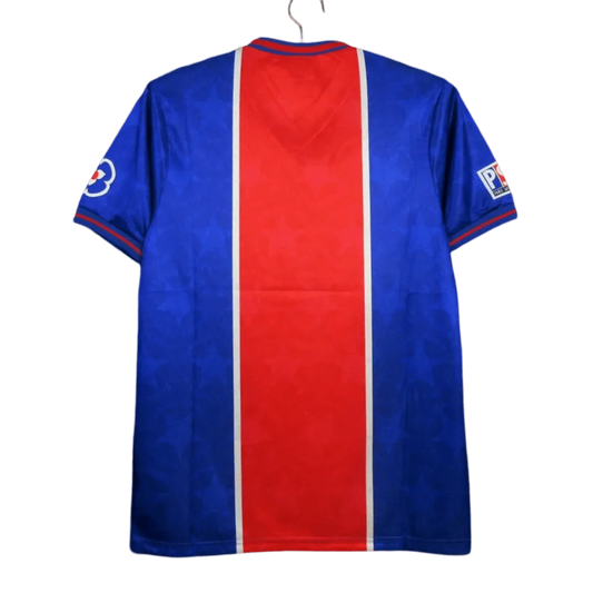 https://cdn.shopify.com/s/files/1/0826/7228/8075/files/19951996-paris-saint-germain-opel-home-retro-jersey-886557.webp?v=1741198000