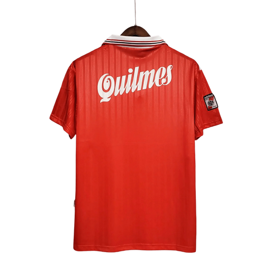 https://cdn.shopify.com/s/files/1/0826/7228/8075/files/19951996-river-plate-quilmes-away-retro-jersey-885935.webp?v=1741197179