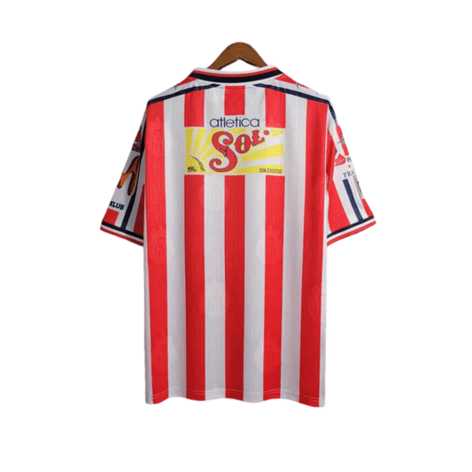 https://cdn.shopify.com/s/files/1/0826/7228/8075/files/19961997-chivas-guadalajara-mexicana-home-retro-jersey-282216.webp?v=1741197159