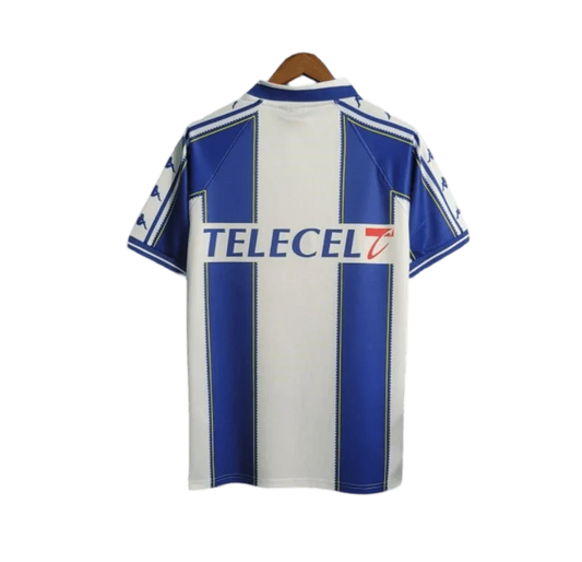 https://cdn.shopify.com/s/files/1/0826/7228/8075/files/19971999-fc-porto-revigres-home-retro-jersey-715048.webp?v=1741199349