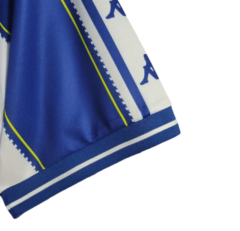 https://cdn.shopify.com/s/files/1/0826/7228/8075/files/19971999-fc-porto-revigres-home-retro-jersey-996146.webp?v=1741199348
