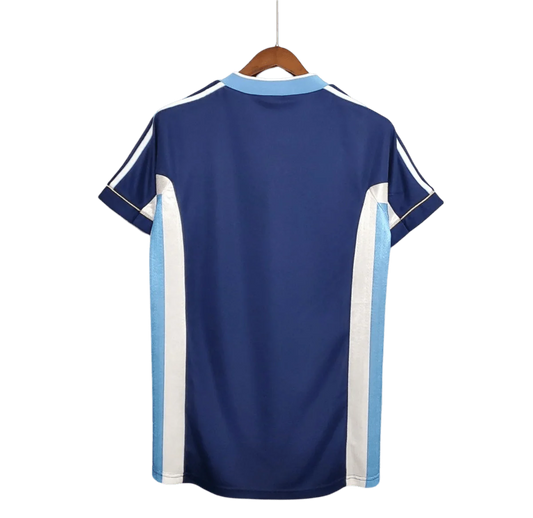 https://cdn.shopify.com/s/files/1/0826/7228/8075/files/1998-argentina-world-cup-away-retro-jersey-696677.webp?v=1741198525