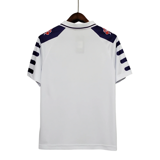 https://cdn.shopify.com/s/files/1/0826/7228/8075/files/19981999-fiorentina-florence-nintendo-fila-away-retro-kit-classickits433-155640.webp?v=1741199023