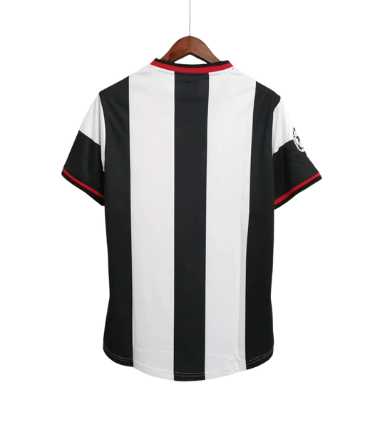 https://cdn.shopify.com/s/files/1/0826/7228/8075/files/19981999-psv-eindhoven-philips-away-blackwhite-retro-kit-classickits433-842513.webp?v=1741198354