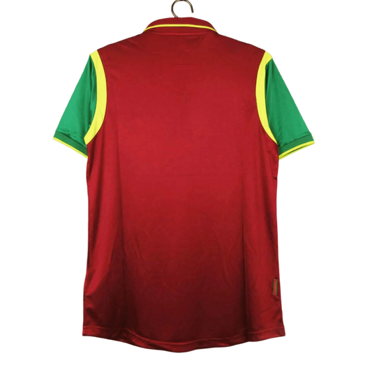 https://cdn.shopify.com/s/files/1/0826/7228/8075/files/19992000-portugal-home-retro-jersey-285456.webp?v=1741198525