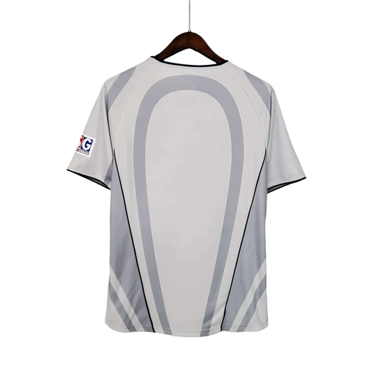 https://cdn.shopify.com/s/files/1/0826/7228/8075/files/20012002-paris-saint-germain-opel-away-grey-retro-jersey-258104.webp?v=1741198007
