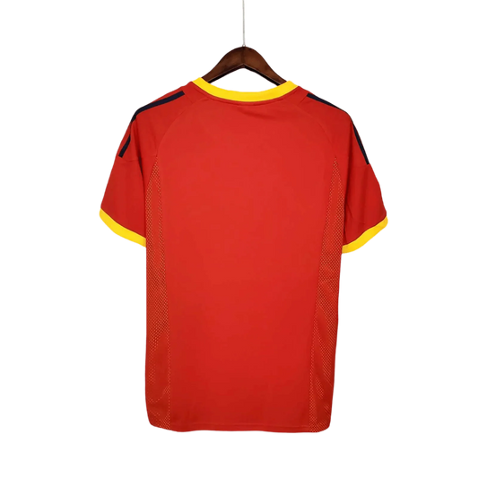 https://cdn.shopify.com/s/files/1/0826/7228/8075/files/2002-spain-home-red-retro-kit-203115.webp?v=1741197165