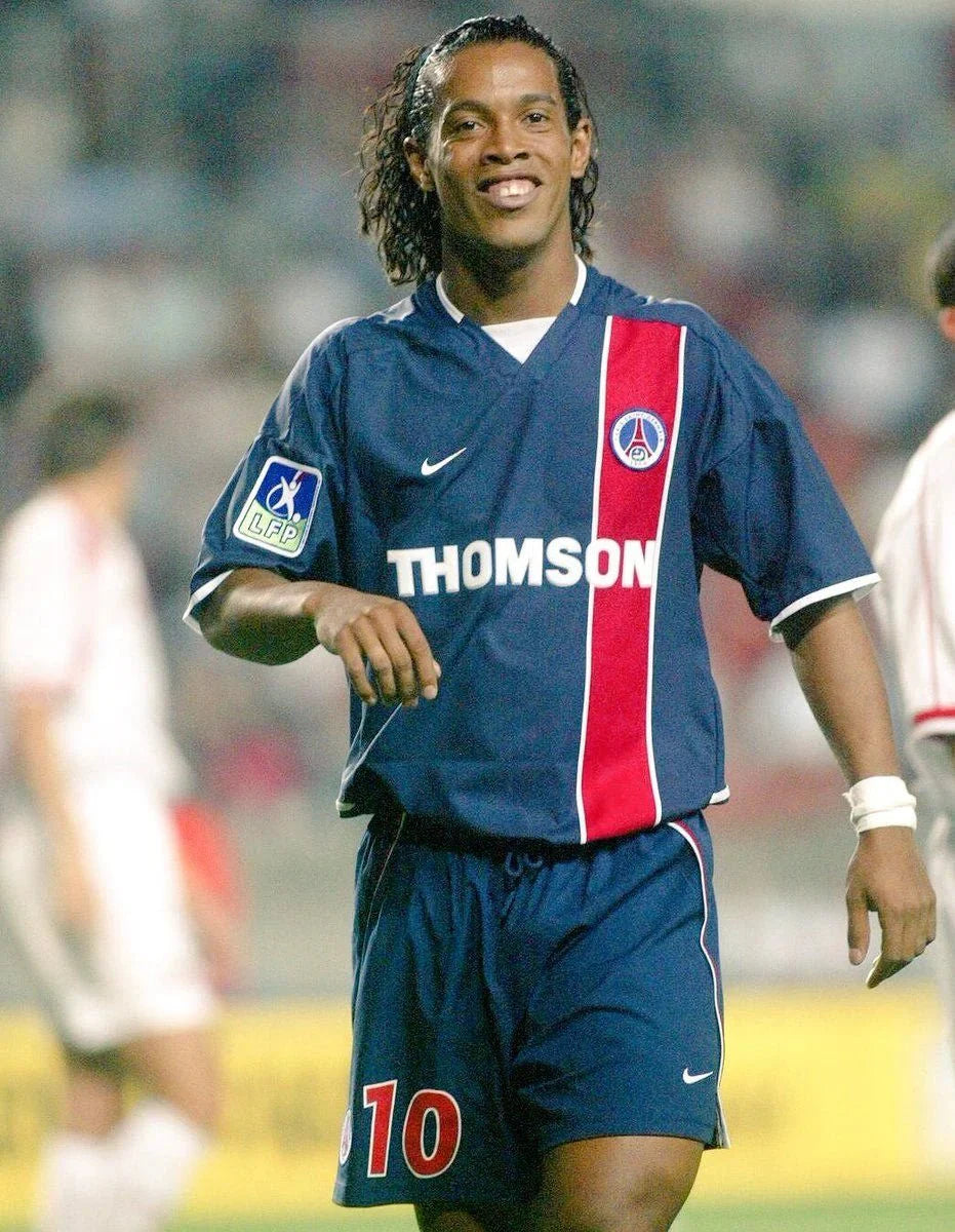 https://cdn.shopify.com/s/files/1/0826/7228/8075/files/20022003-paris-saint-germain-thomson-home-retro-jersey-730781.webp?v=1741199395