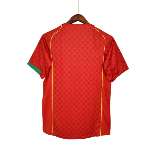 https://cdn.shopify.com/s/files/1/0826/7228/8075/files/20042005-portugal-home-retro-jersey-821385.webp?v=1741198530