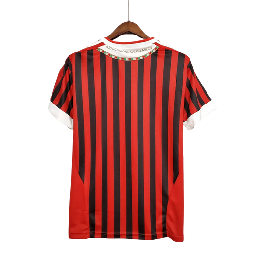 https://cdn.shopify.com/s/files/1/0826/7228/8075/files/20112012-ac-milan-fly-emirates-home-retro-kit-666568.webp?v=1741197294