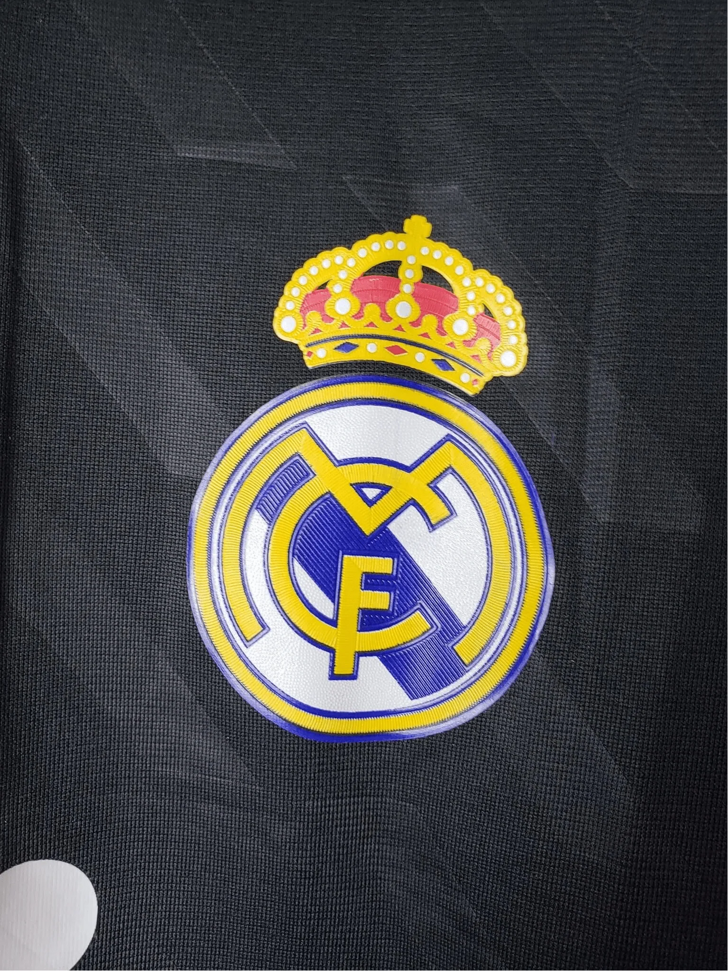 https://cdn.shopify.com/s/files/1/0826/7228/8075/files/20112012-real-madrid-bwin-away-retro-kit-long-sleeve-610625.webp?v=1741197456