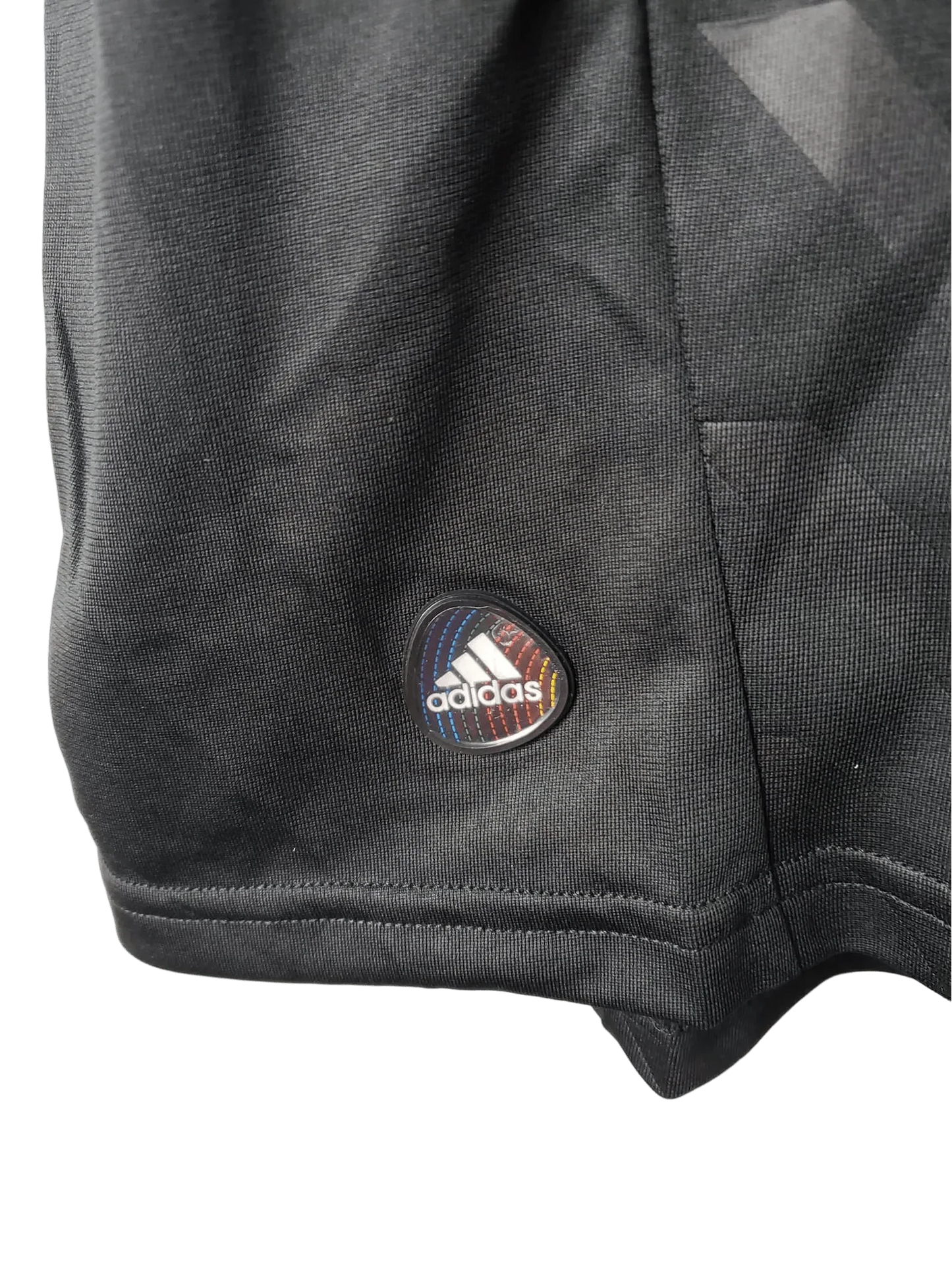 https://cdn.shopify.com/s/files/1/0826/7228/8075/files/20112012-real-madrid-bwin-away-retro-kit-short-sleeve-703429.webp?v=1741197467