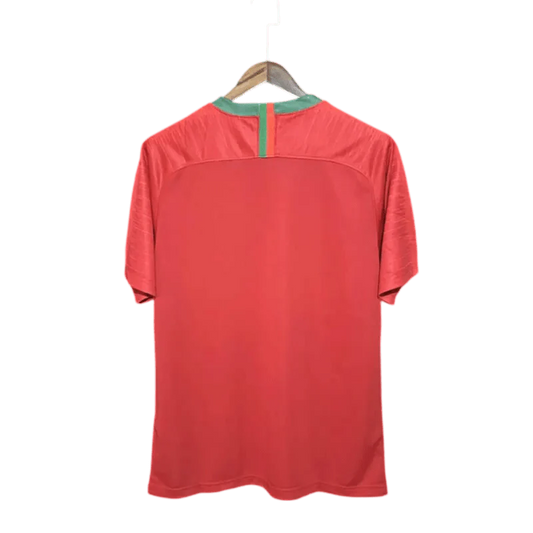 https://cdn.shopify.com/s/files/1/0826/7228/8075/files/2018-portugal-home-retro-kit-157618.webp?v=1741197177