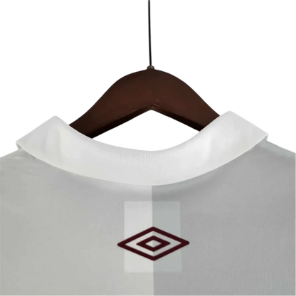 https://cdn.shopify.com/s/files/1/0826/7228/8075/files/120th-anniversary-fluminense-betano-white-grey-retro-kit-256443.webp?v=1741197186