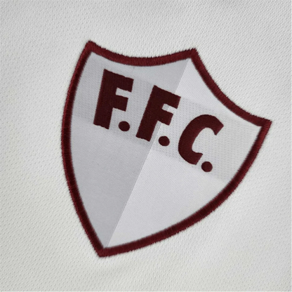 https://cdn.shopify.com/s/files/1/0826/7228/8075/files/120th-anniversary-fluminense-betano-white-grey-retro-kit-518314.webp?v=1741197291