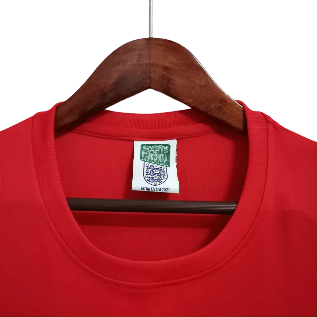 https://cdn.shopify.com/s/files/1/0826/7228/8075/files/1966-england-away-retro-kit-486549.webp?v=1741196946