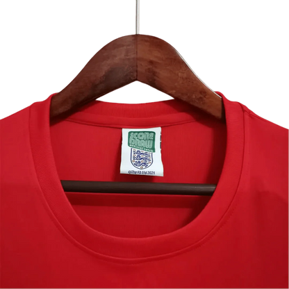 https://cdn.shopify.com/s/files/1/0826/7228/8075/files/1966-england-away-retro-kit-486549.webp?v=1741196946