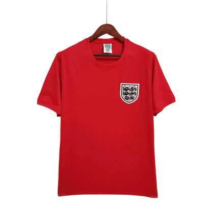 https://cdn.shopify.com/s/files/1/0826/7228/8075/files/1966-england-away-retro-kit-584747.webp?v=1741196944