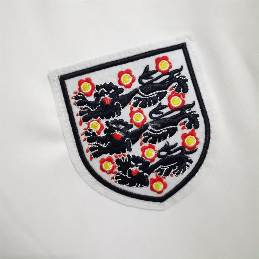 https://cdn.shopify.com/s/files/1/0826/7228/8075/files/1966-england-home-retro-kit-198318.webp?v=1741196958