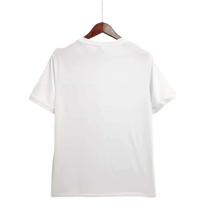 https://cdn.shopify.com/s/files/1/0826/7228/8075/files/1966-england-home-retro-kit-274391.webp?v=1741196955