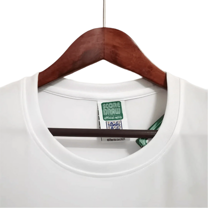 https://cdn.shopify.com/s/files/1/0826/7228/8075/files/1966-england-home-retro-kit-384327.webp?v=1741196957