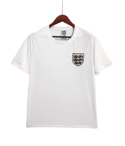 https://cdn.shopify.com/s/files/1/0826/7228/8075/files/1966-england-home-retro-kit-430032.webp?v=1741196955