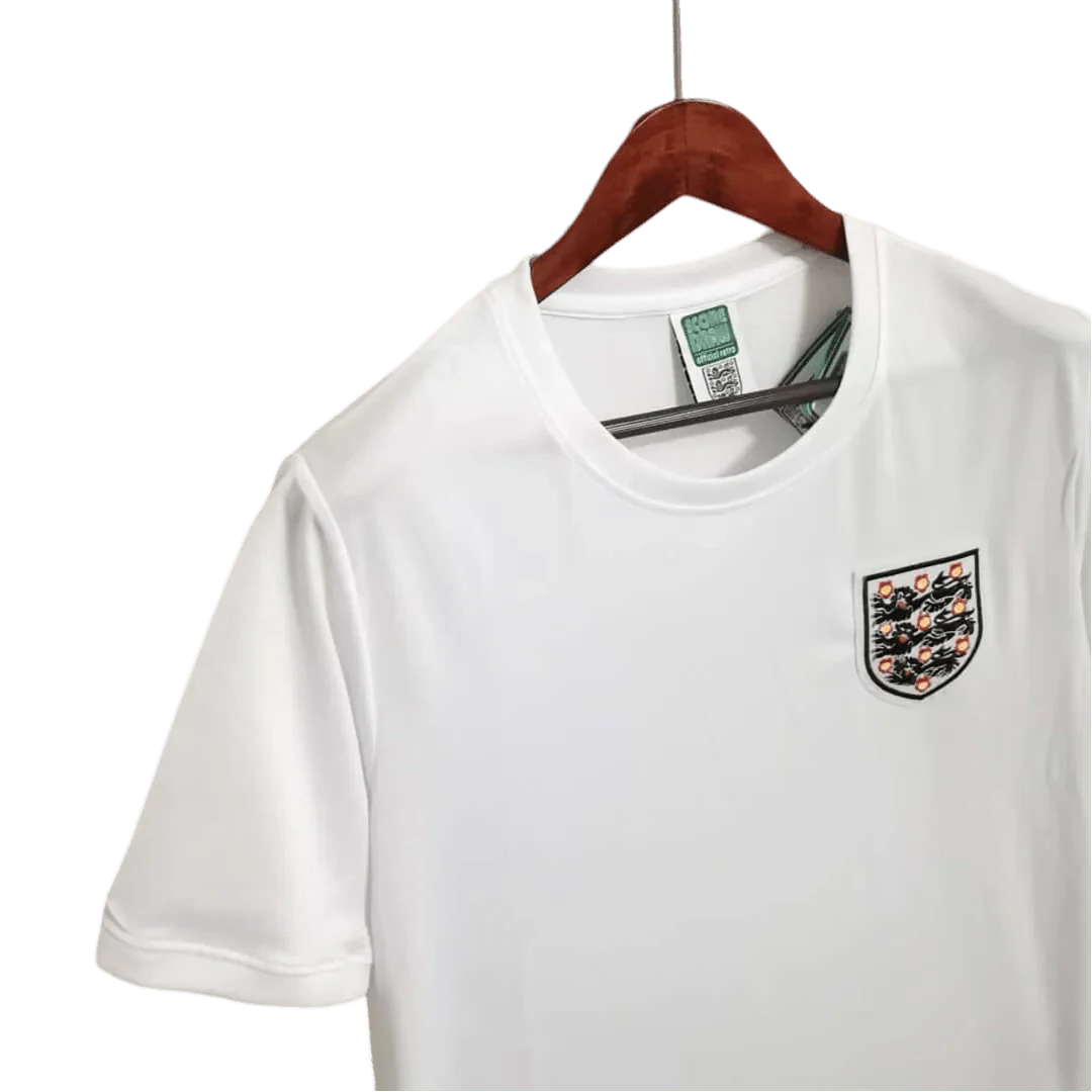 https://cdn.shopify.com/s/files/1/0826/7228/8075/files/1966-england-home-retro-kit-543667.webp?v=1741196955