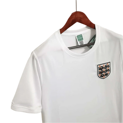 https://cdn.shopify.com/s/files/1/0826/7228/8075/files/1966-england-home-retro-kit-543667.webp?v=1741196955