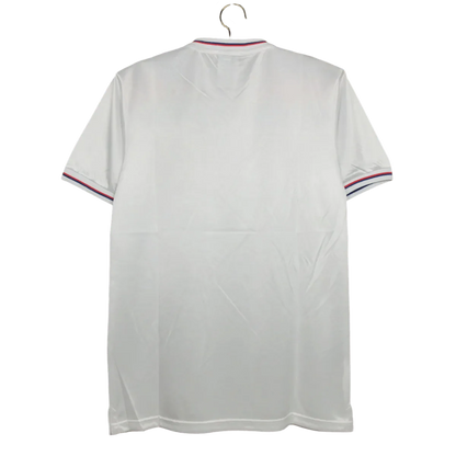 https://cdn.shopify.com/s/files/1/0826/7228/8075/files/1980-england-home-retro-kit-303281.webp?v=1741196942