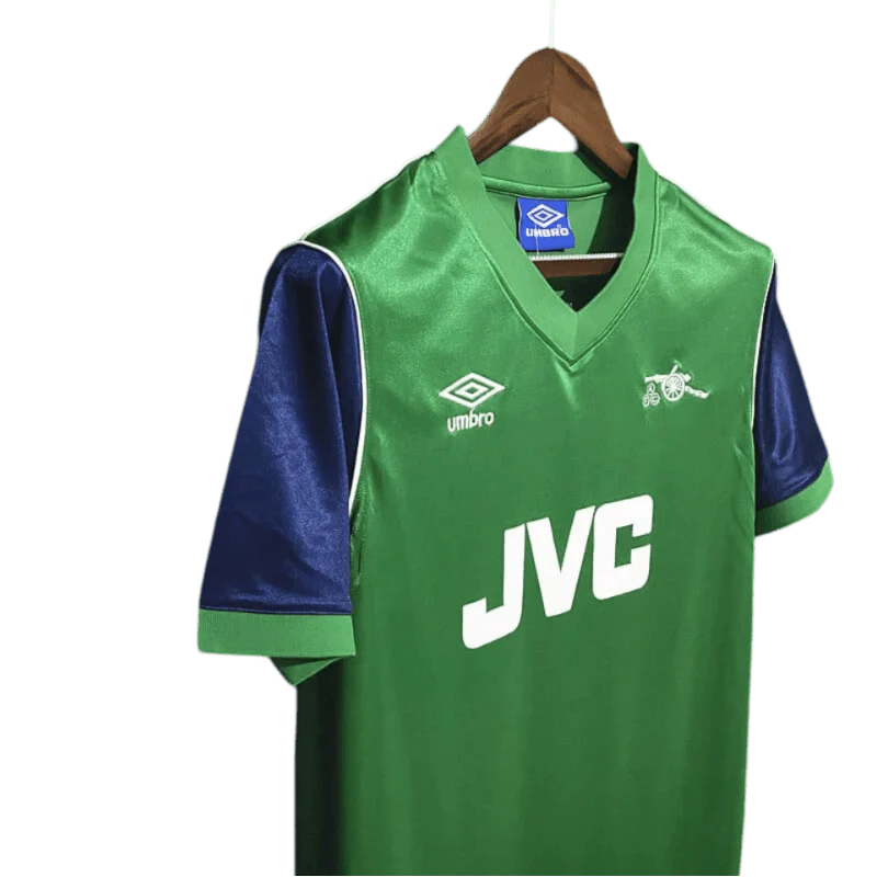 https://cdn.shopify.com/s/files/1/0826/7228/8075/files/19821983-arsenal-jvc-green-away-retro-kit-classickits433-896885.webp?v=1741199317