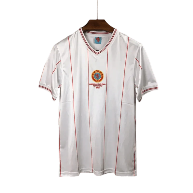 https://cdn.shopify.com/s/files/1/0826/7228/8075/files/19821983-aston-villa-away-retro-kit-classickits433-956391.webp?v=1741198341