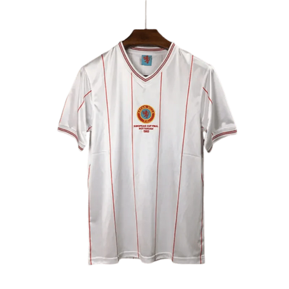 https://cdn.shopify.com/s/files/1/0826/7228/8075/files/19821983-aston-villa-away-retro-kit-classickits433-956391.webp?v=1741198341