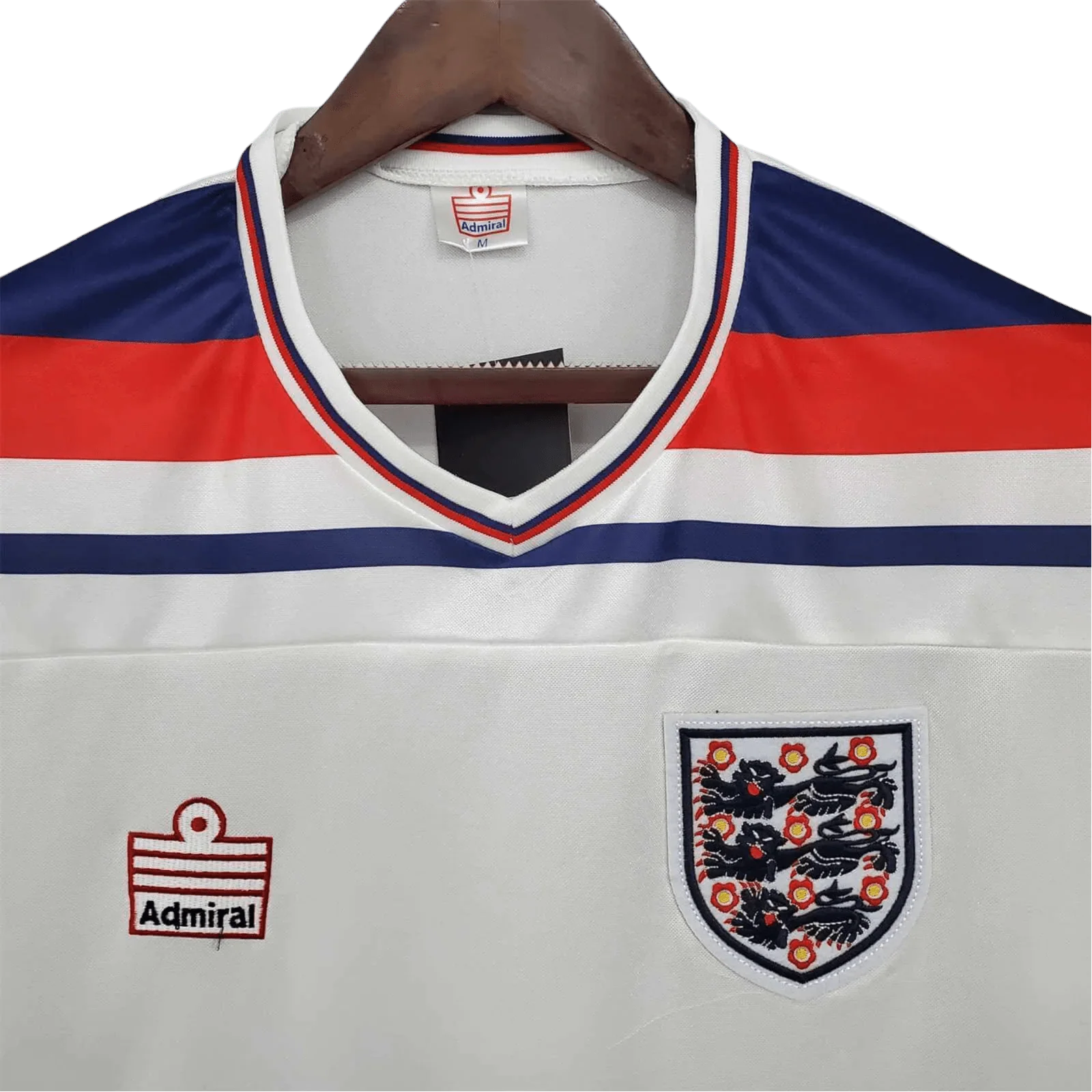 https://cdn.shopify.com/s/files/1/0826/7228/8075/files/19821983-england-home-retro-kit-classickits433-407128.webp?v=1741198465