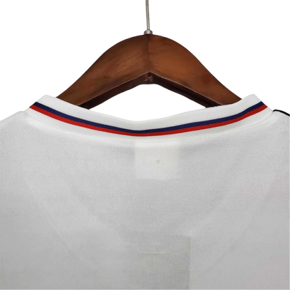 https://cdn.shopify.com/s/files/1/0826/7228/8075/files/19821983-england-home-retro-kit-classickits433-618330.webp?v=1741198464