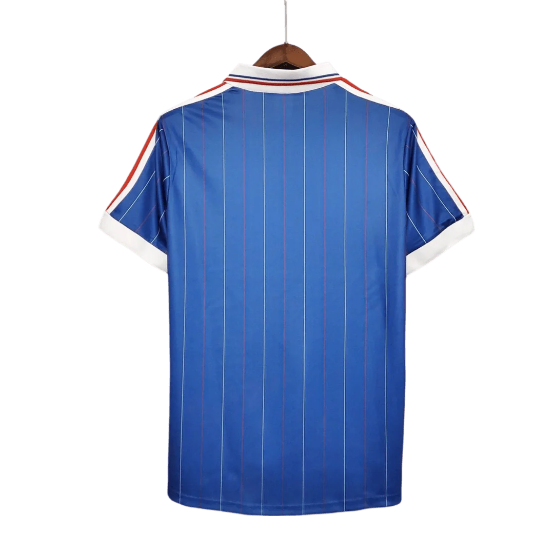 https://cdn.shopify.com/s/files/1/0826/7228/8075/files/19821983-france-home-retro-jersey-671265.webp?v=1741198521