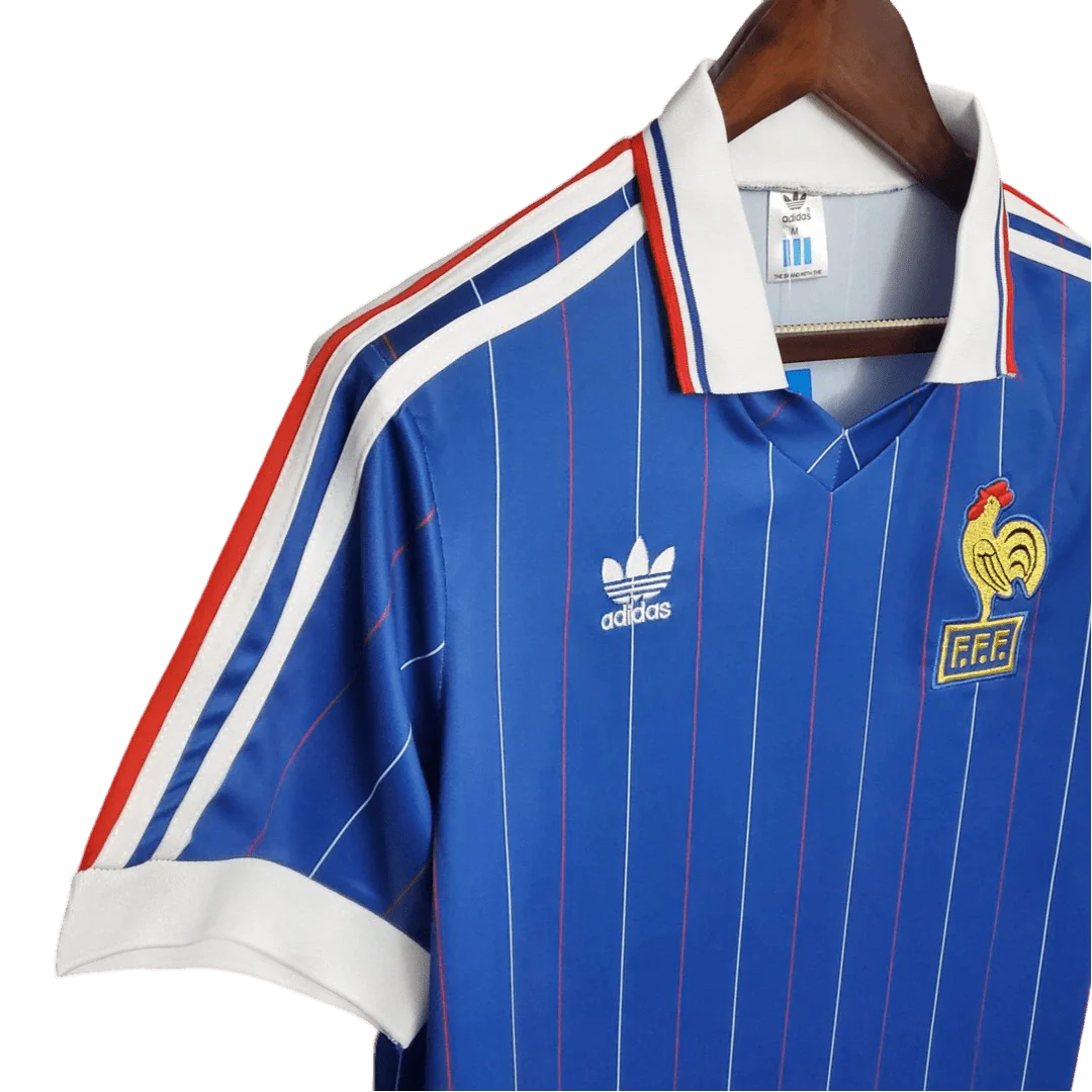 https://cdn.shopify.com/s/files/1/0826/7228/8075/files/19821983-france-home-retro-jersey-874957.webp?v=1741198521