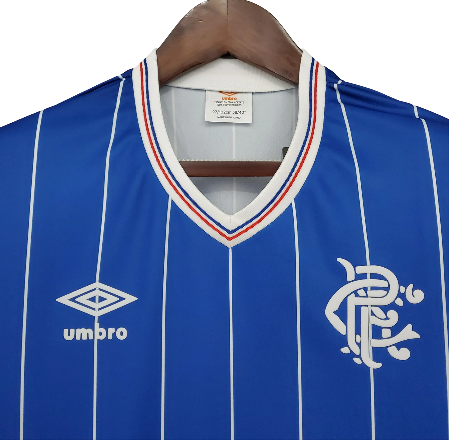 https://cdn.shopify.com/s/files/1/0826/7228/8075/files/19821983-glasgow-rangers-home-kit-classickits433-250140.webp?v=1741199180