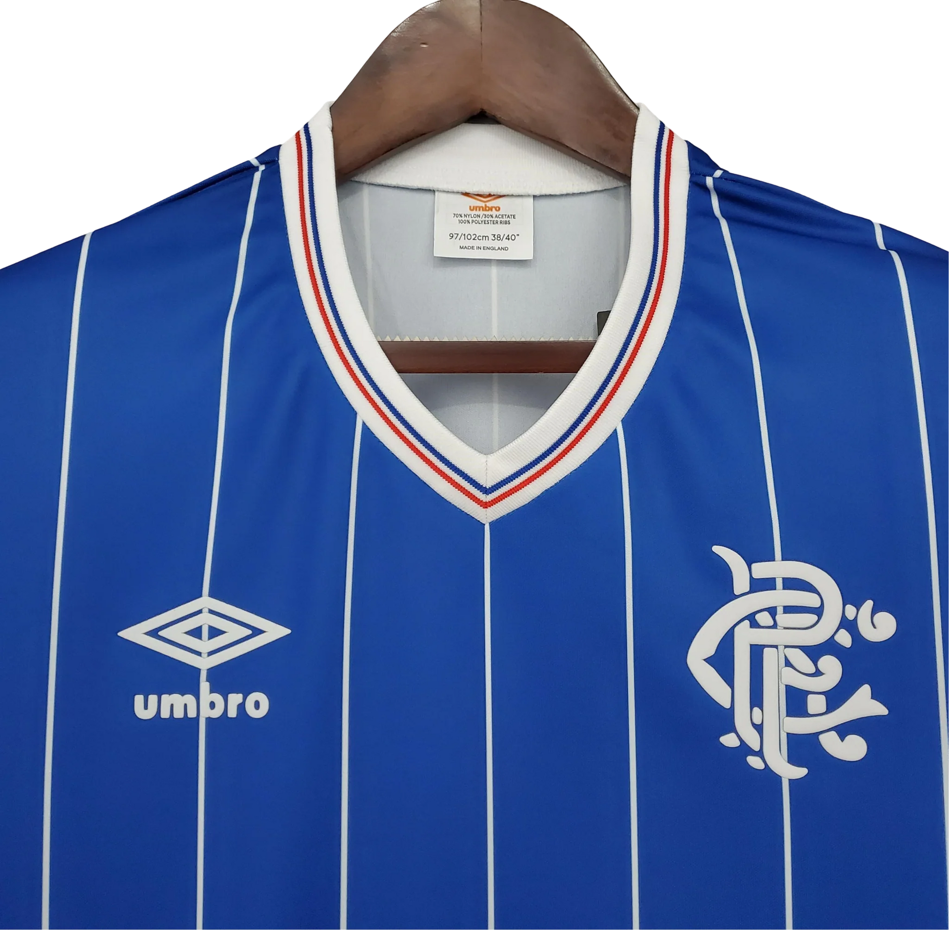 https://cdn.shopify.com/s/files/1/0826/7228/8075/files/19821983-glasgow-rangers-home-kit-classickits433-250140.webp?v=1741199180